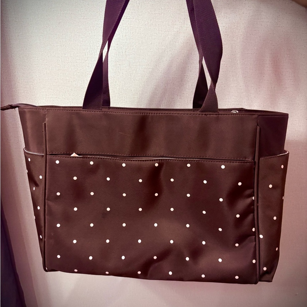 Dark coffee dipper bag whit details in pink interior good condition